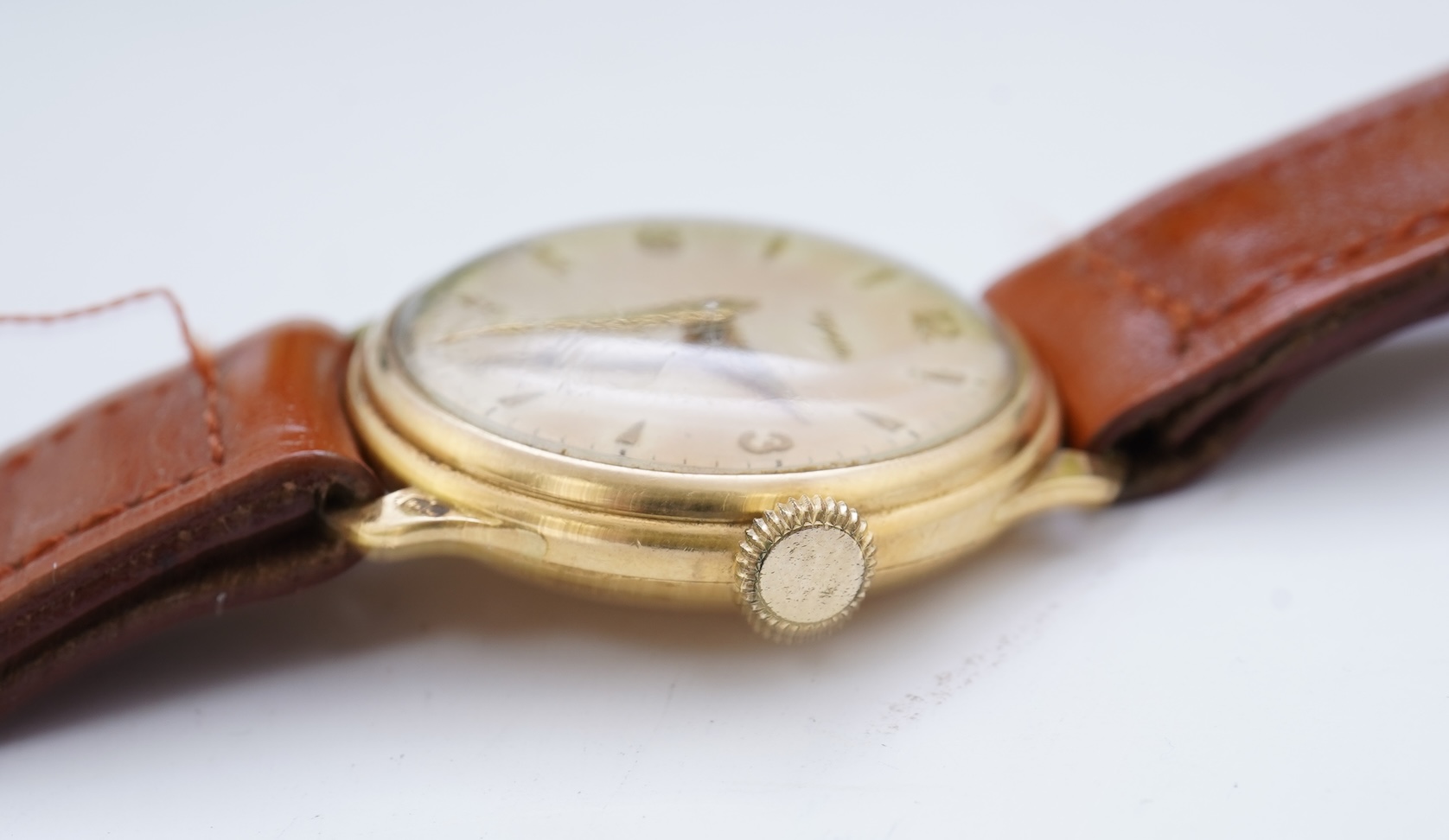 A gentleman's 1950's 18ct gold Zenith manual wind wrist watch